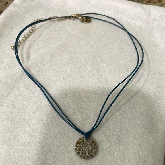 Lia Sophia Spotlight Crystal
Pave Coin Gold Tone Pendant Blue
Cord Necklace - Picture 3 of 6